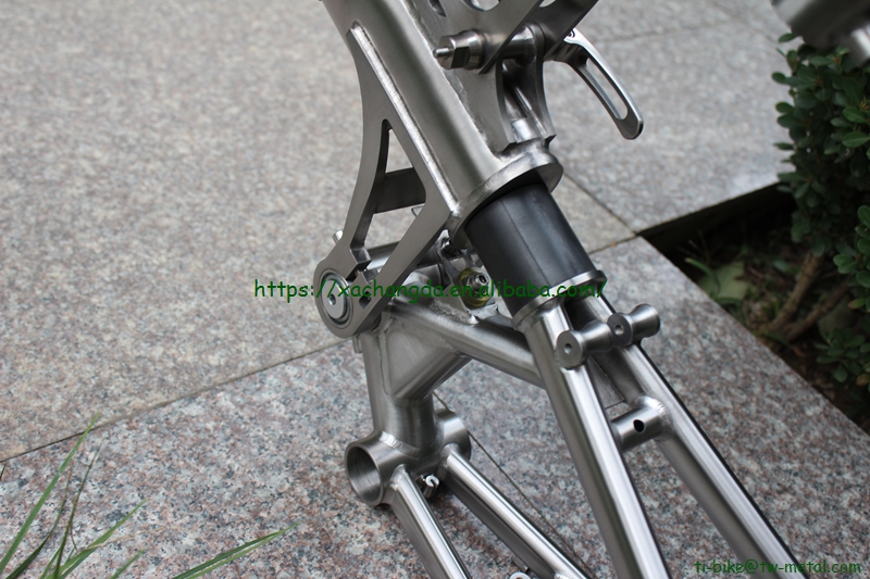 Custom titanium fold bike frame with 41T and 47T chain rings