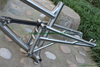 Titanium suspension bike frame with thru axle design