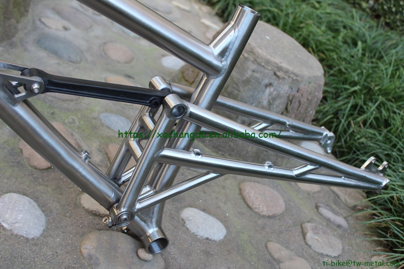 Titanium suspension bike frame with thru axle design