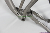 custom titanium suspension bicycle frame with tapered head tube and thru axle dropouts