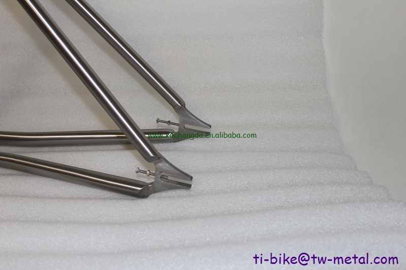 custom track bicycle frame with a long seat tube