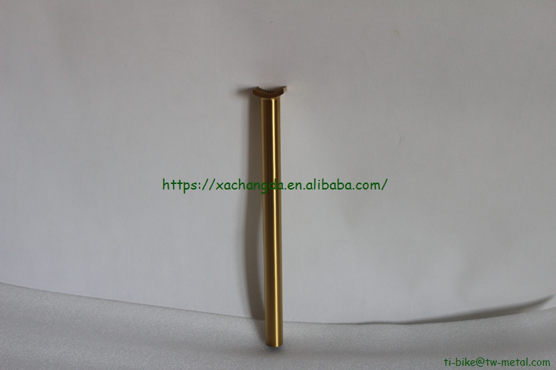 titanium BMX bike frame with integrated head tube in golden color