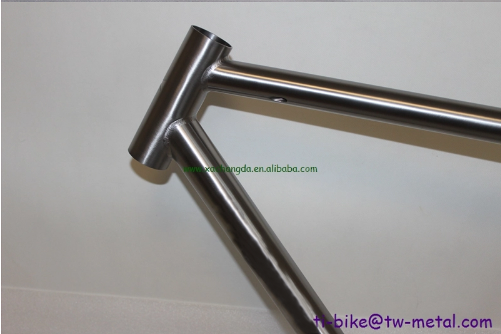 custom track bicycle frame with a long seat tube