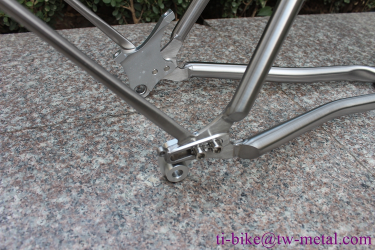 Titanium gravel bike frame with integrated rear rack