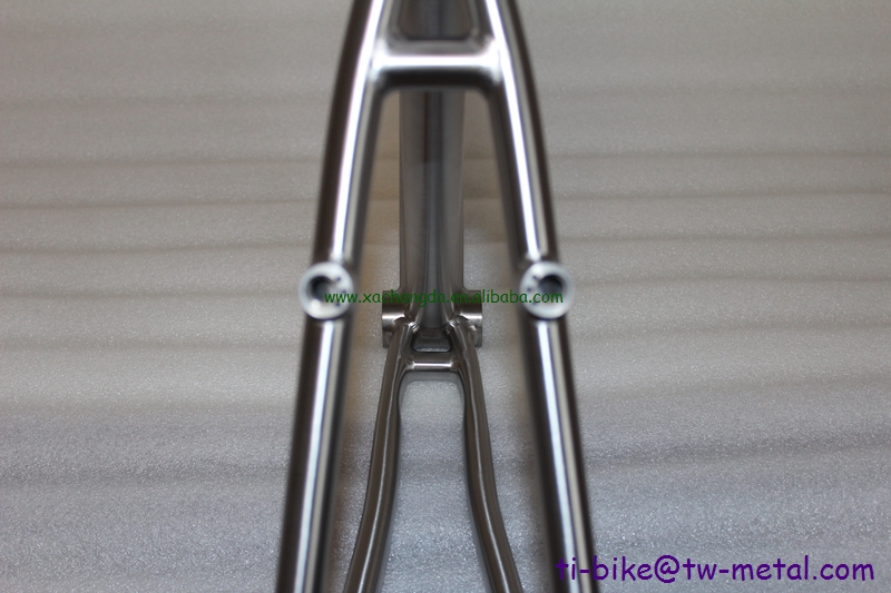 custom track bicycle frame with a long seat tube