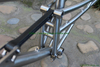 Titanium suspension bike frame with thru axle design