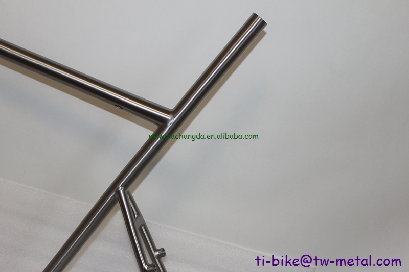 custom track bicycle frame with a long seat tube