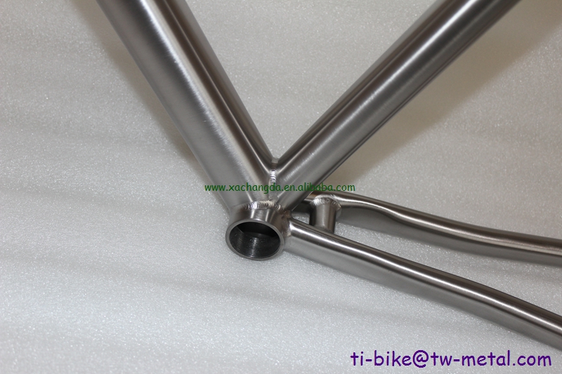 custom track bicycle frame with a long seat tube