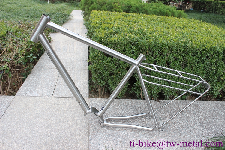 Titanium gravel bike frame with integrated rear rack